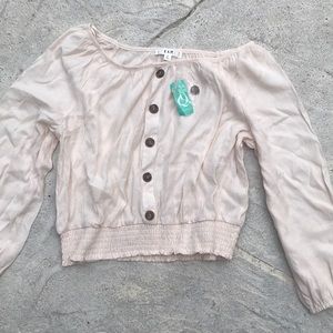 Cream colored off the shoulder top